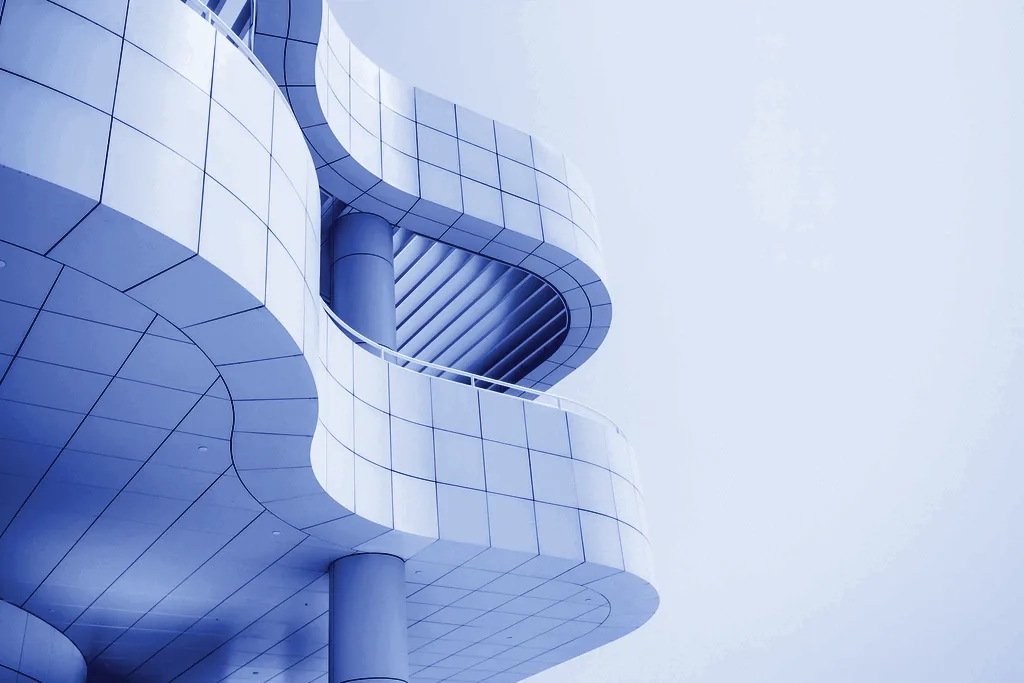 White façade with curved balconies